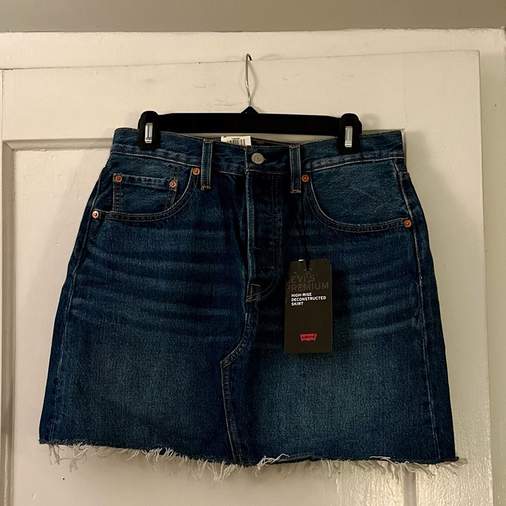 Levi's high-rise deconstructed denim mini skirt. Button fly. Size 30. New.